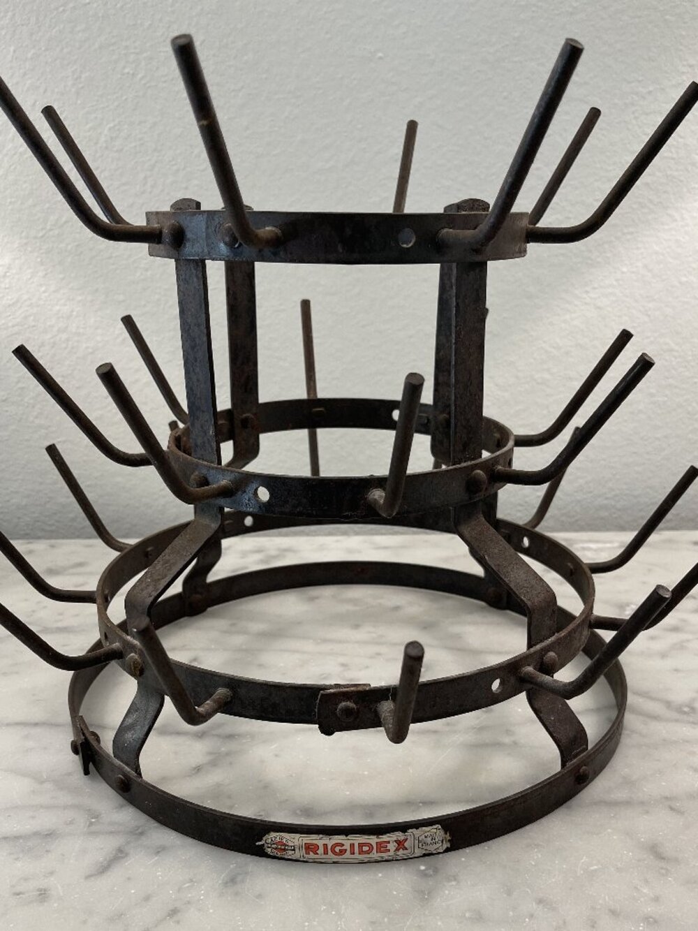 Vintage French Rigidex iron bottle drying rack, used to wash wine bottles